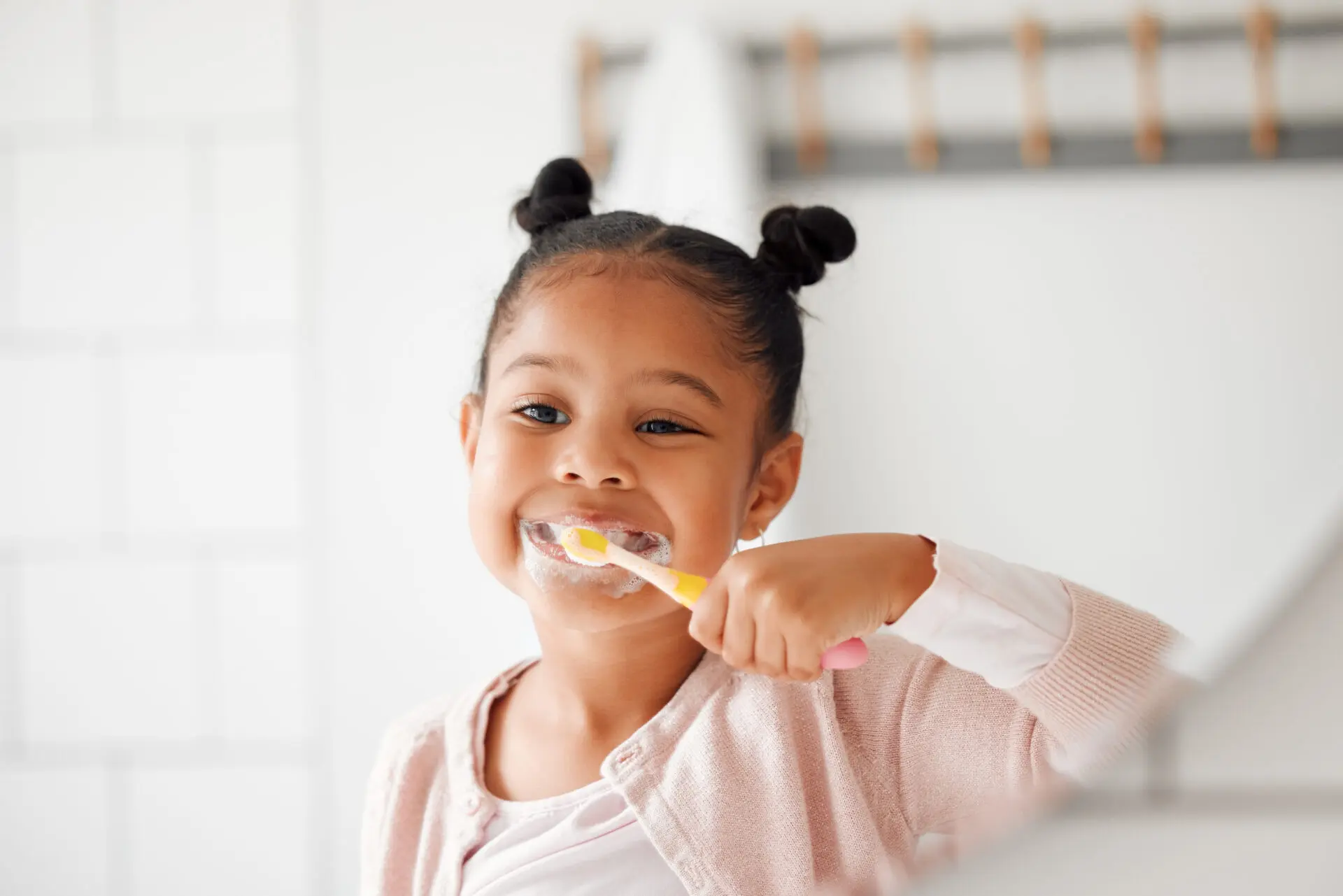 Toothbrush, brushing teeth and child in a home bathroom for dental health and wellness. 